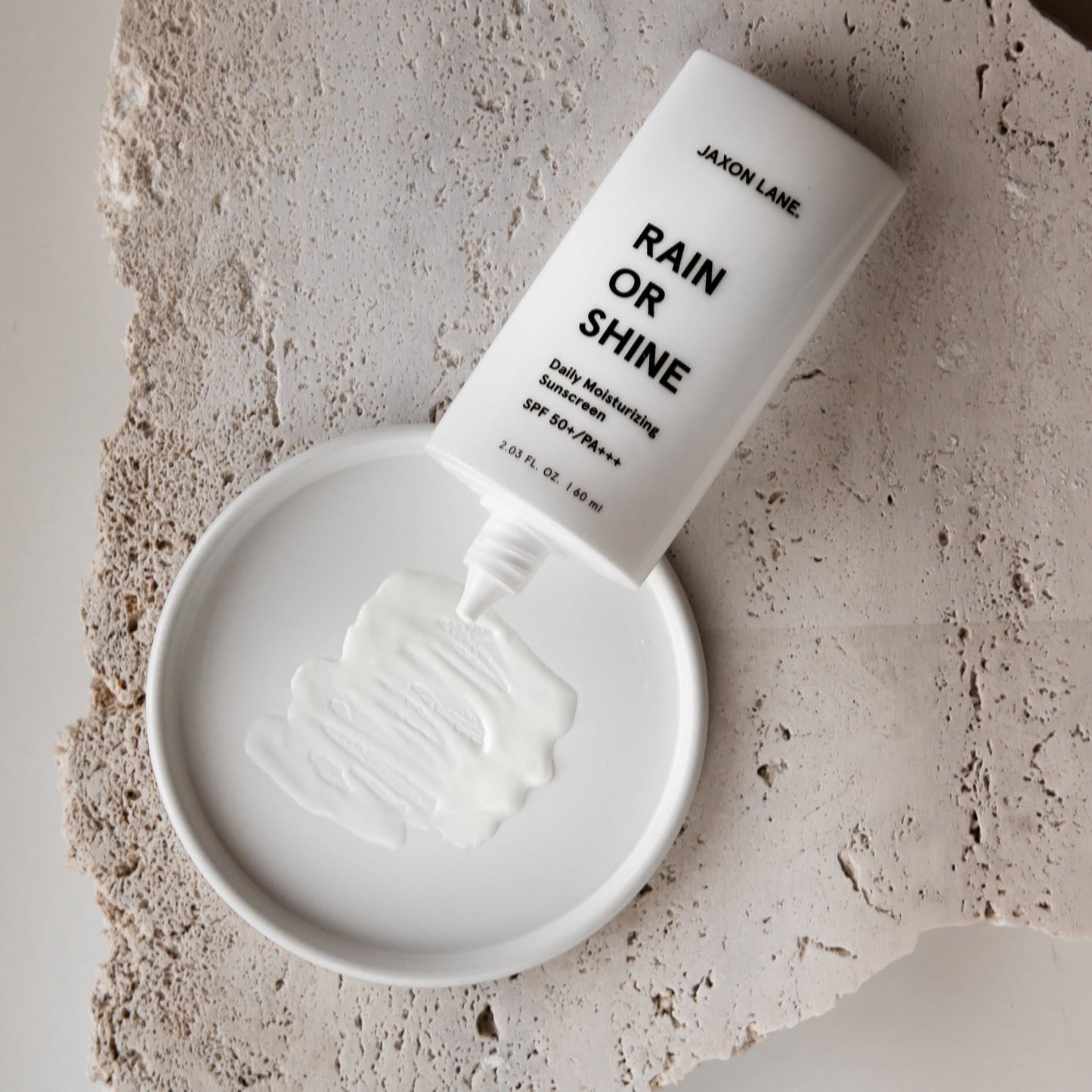 Rain or Shine Daily Moisturizing Sunscreen - BTWNTHESHEETS